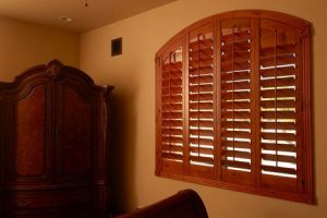 arched wood shutters